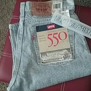 Levi's 550 whitewashed Pinstriped jeans.